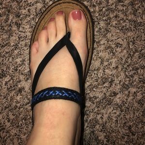 Black and blue UGG sandals